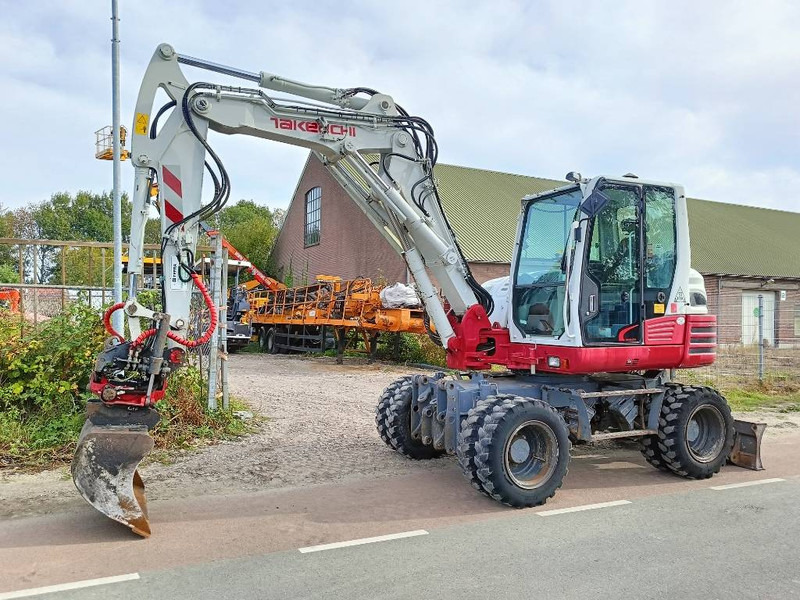 Takeuchi TB 295 W mobiele graafmachine mobile excavator - Escavadeira de rodas: foto 1 Takeuchi TB 295 W mobiele graafmachine mobile excavator - Escavadeira de rodas: foto 1