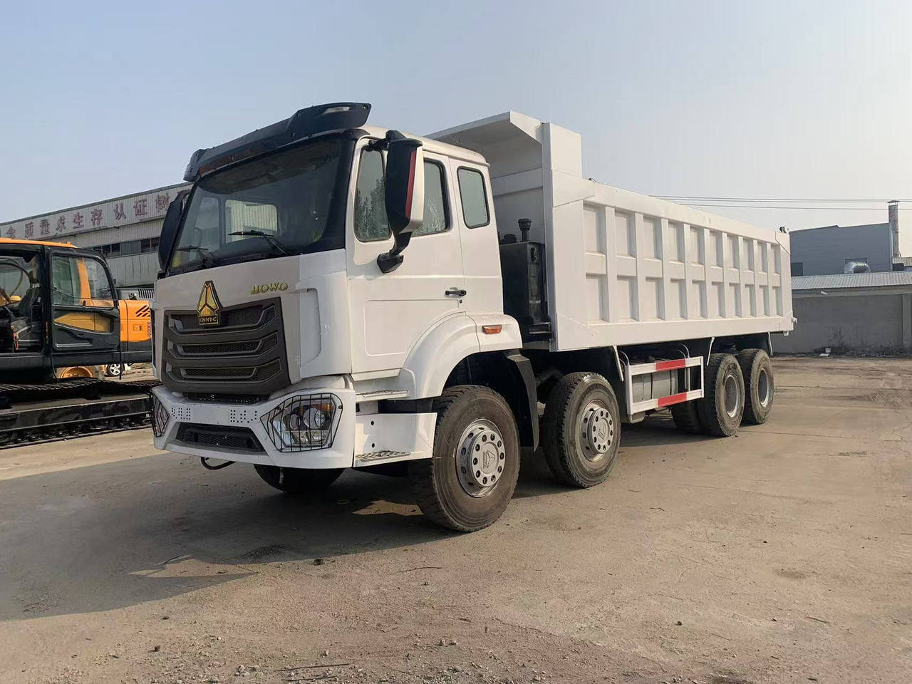 Howo 8x4 Tipper Truck Used Condition HOWO Dumper Truck Left Hand Drive - Caminhão basculante: foto 2 Howo 8x4 Tipper Truck Used Condition HOWO Dumper Truck Left Hand Drive - Caminhão basculante: foto 2