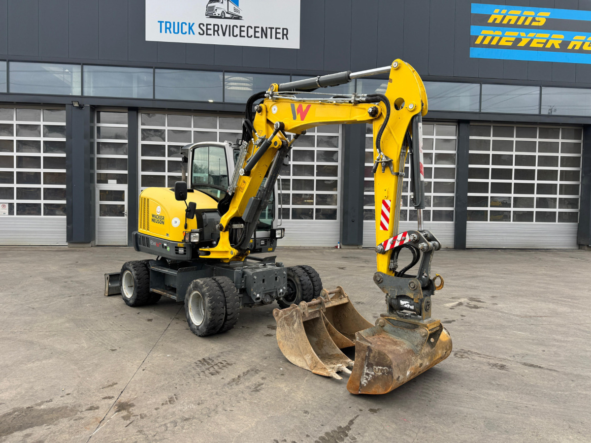 NEUSON EW65 E14-2 Powertilt 3x Schaufeln - Escavadeira de rodas: foto 2 NEUSON EW65 E14-2 Powertilt 3x Schaufeln - Escavadeira de rodas: foto 2