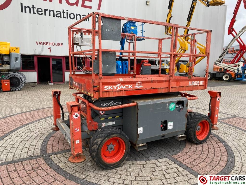 SkyJack SJ6826 RT Diesel 4x4 Scissor Work Lift 992cm - Plataforma de Tijera/ Plataforma de tesoura: foto 1 SkyJack SJ6826 RT Diesel 4x4 Scissor Work Lift 992cm - Plataforma de Tijera/ Plataforma de tesoura: foto 1