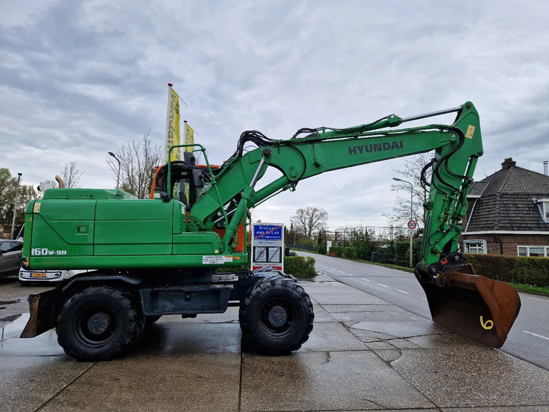 Hyundai Robex 160W-9A met 6-cilinder Cummins motor - Escavadeira de rodas: foto 2 Hyundai Robex 160W-9A met 6-cilinder Cummins motor - Escavadeira de rodas: foto 2