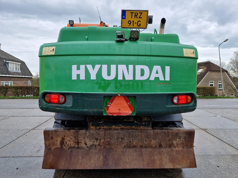 Hyundai Robex 160W-9A met 6-cilinder Cummins motor - Escavadeira de rodas: foto 3 Hyundai Robex 160W-9A met 6-cilinder Cummins motor - Escavadeira de rodas: foto 3