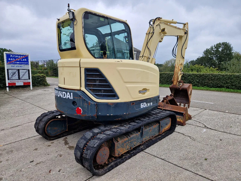 Hyundai Robex CR60-9 met airco en 3 bakken - Mini escavadeira: foto 4 Hyundai Robex CR60-9 met airco en 3 bakken - Mini escavadeira: foto 4