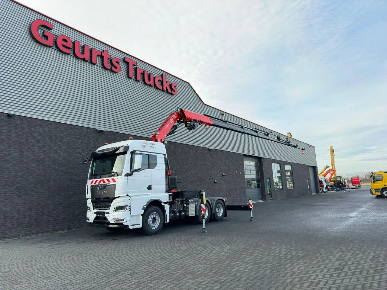 MAN TGX 33.520 6X4 TREKKER-BAKWAGEN COMBI + FASSI F4 - Caminhão grua: foto 2 MAN TGX 33.520 6X4 TREKKER-BAKWAGEN COMBI + FASSI F4 - Caminhão grua: foto 2