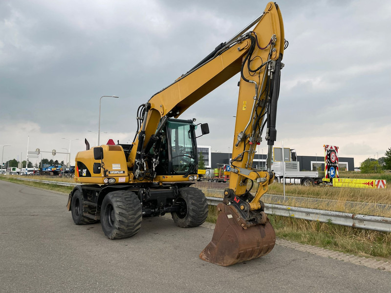 Escavadeira de rodas Caterpillar M313D - CE: foto 7