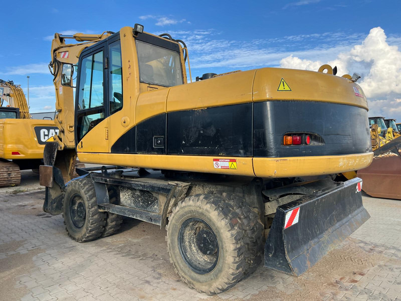 Caterpillar M318C - Escavadeira: foto 1 Caterpillar M318C - Escavadeira: foto 1