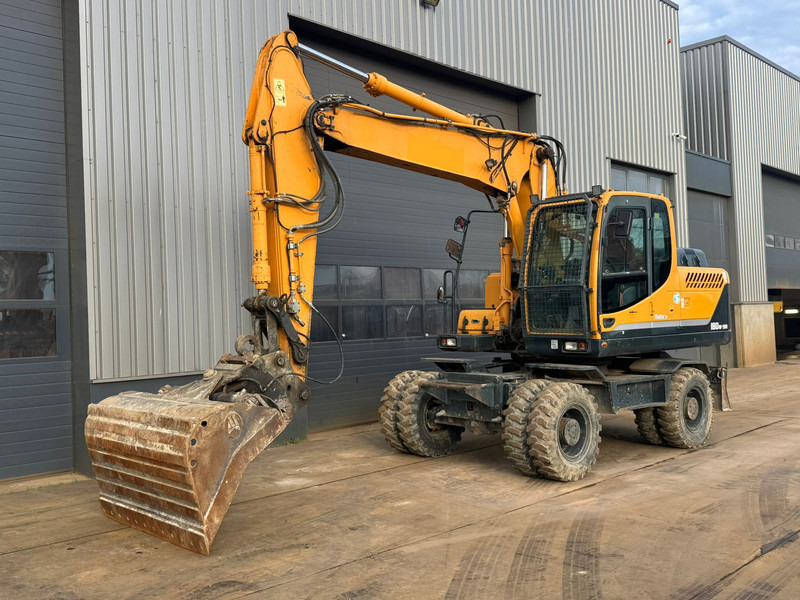 Hyundai Robex 180W-9A - Escavadeira de rodas: foto 2 Hyundai Robex 180W-9A - Escavadeira de rodas: foto 2