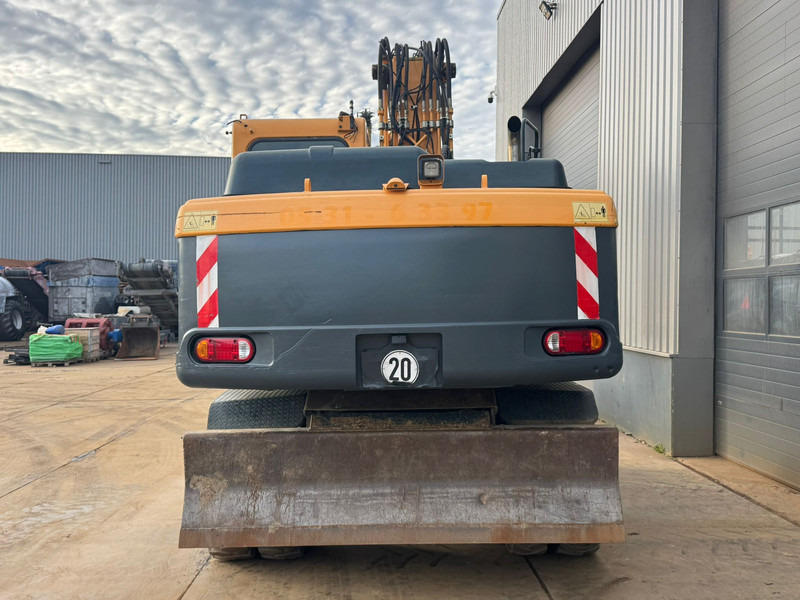 Hyundai Robex 180W-9A - Escavadeira de rodas: foto 4 Hyundai Robex 180W-9A - Escavadeira de rodas: foto 4