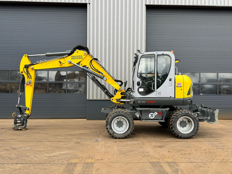 WACKER NEUSON EW100 E06-03 - Escavadeira de rodas: foto 1 WACKER NEUSON EW100 E06-03 - Escavadeira de rodas: foto 1