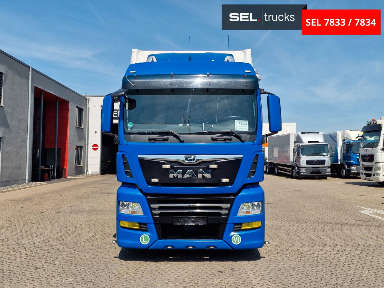 MAN TGX 18.500 4X2 LL-U / Intarder/Durchlade/Hubdach - Caminhão com lona: foto 2 MAN TGX 18.500 4X2 LL-U / Intarder/Durchlade/Hubdach - Caminhão com lona: foto 2