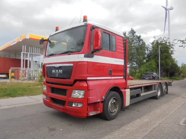 MAN TGX 26.440 6X2 GESTUURDE AS - Camião de caixa aberta/ Plataforma: foto 1 MAN TGX 26.440 6X2 GESTUURDE AS - Camião de caixa aberta/ Plataforma: foto 1