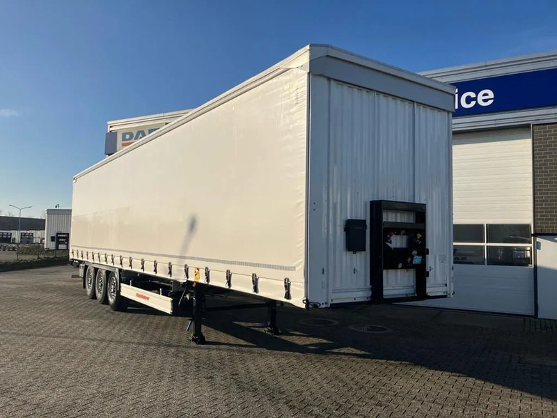 Kässbohrer SCS X / 90 - 12 /27 met hefdak en twee liftassen - Semi-reboque de lona: foto 2 Kässbohrer SCS X / 90 - 12 /27 met hefdak en twee liftassen - Semi-reboque de lona: foto 2