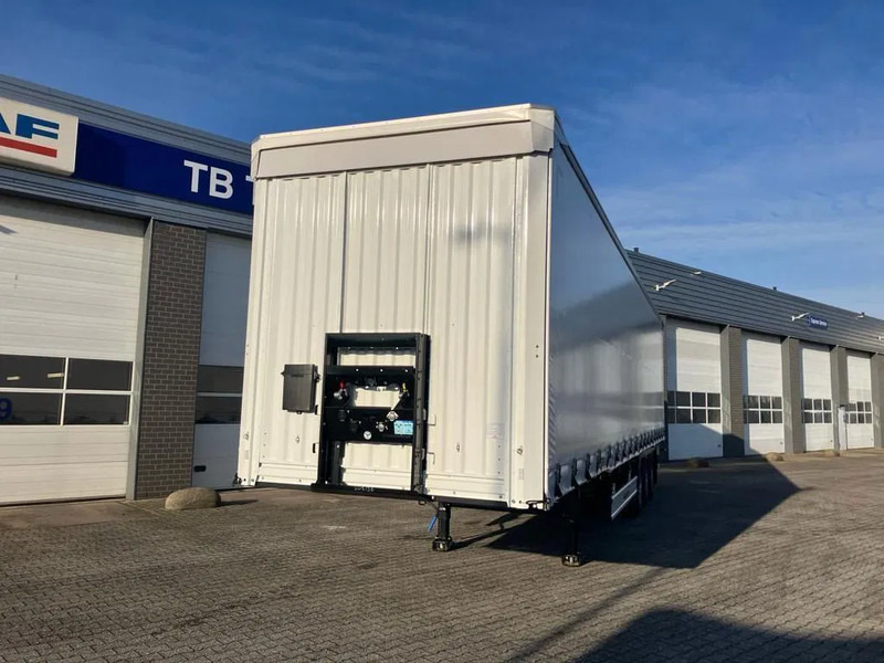 Kässbohrer SCS X / 90 - 12 /27 met hefdak en twee liftassen - Semi-reboque de lona: foto 3 Kässbohrer SCS X / 90 - 12 /27 met hefdak en twee liftassen - Semi-reboque de lona: foto 3