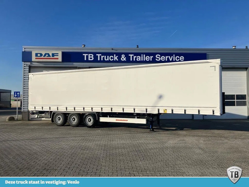 Kässbohrer SCS X / 90 - 12 /27 met hefdak en twee liftassen - Semi-reboque de lona: foto 1 Kässbohrer SCS X / 90 - 12 /27 met hefdak en twee liftassen - Semi-reboque de lona: foto 1