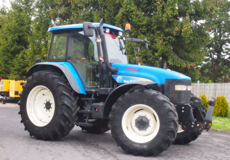 Ciągnik New Holland TM 140 2004 Przedni TUZ - Trator: foto 1 Ciągnik New Holland TM 140 2004 Przedni TUZ - Trator: foto 1