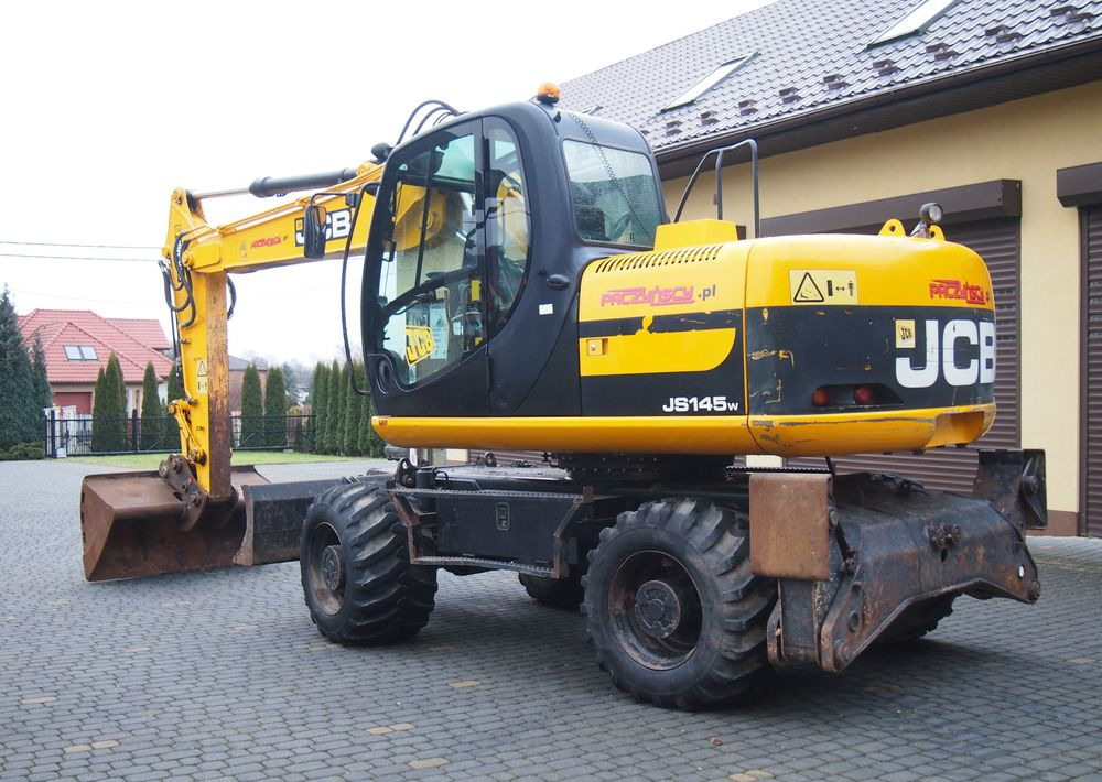 Koparka kołowa JCB JS145W 2011 Koparka JCB - Escavadeira de rodas: foto 5 Koparka kołowa JCB JS145W 2011 Koparka JCB - Escavadeira de rodas: foto 5
