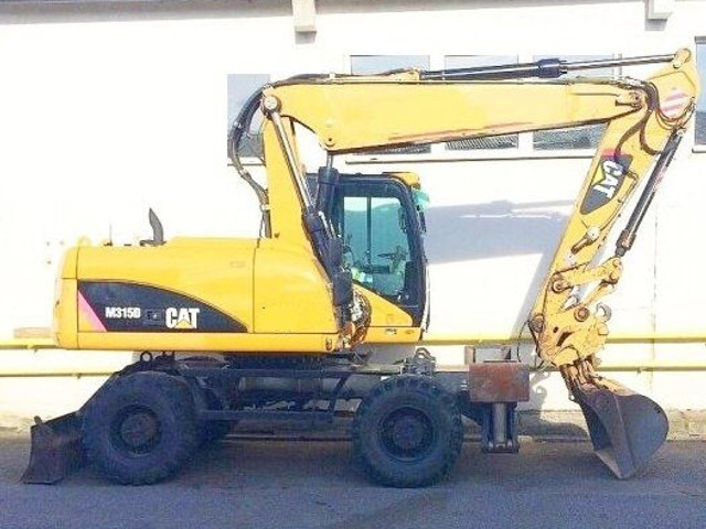Caterpillar M 315 D - Escavadeira de rodas: foto 1 Caterpillar M 315 D - Escavadeira de rodas: foto 1