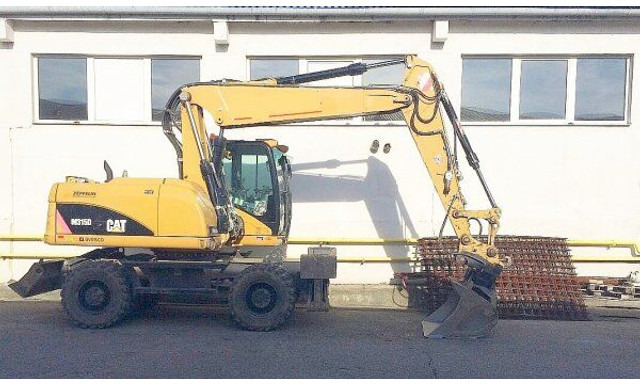 Caterpillar M 315 D - Escavadeira de rodas: foto 2 Caterpillar M 315 D - Escavadeira de rodas: foto 2