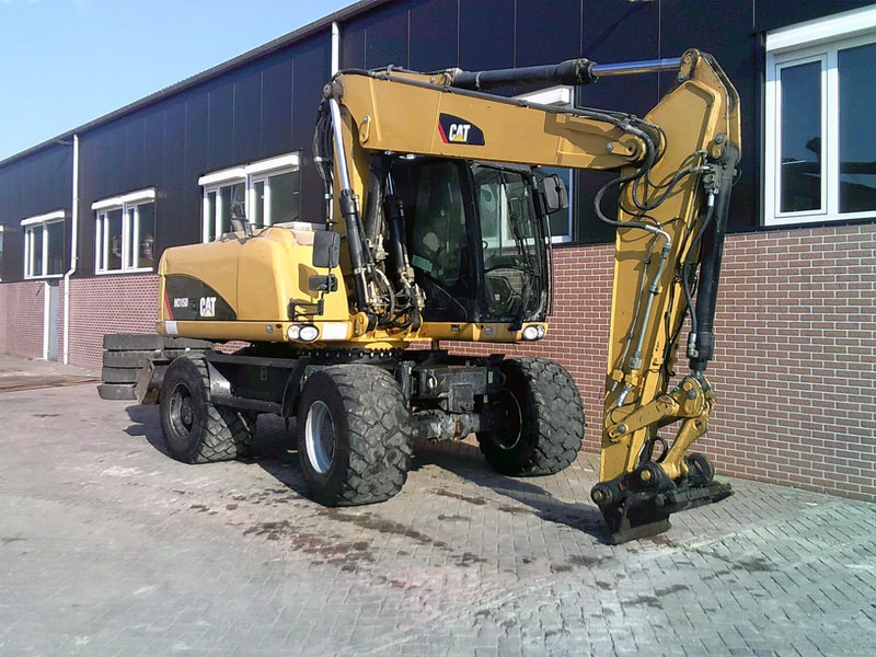 Caterpillar M315D - Escavadeira de rodas: foto 4 Caterpillar M315D - Escavadeira de rodas: foto 4