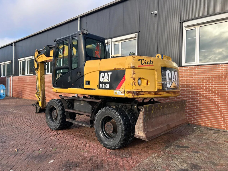 Caterpillar M316D - Escavadeira de rodas: foto 4 Caterpillar M316D - Escavadeira de rodas: foto 4