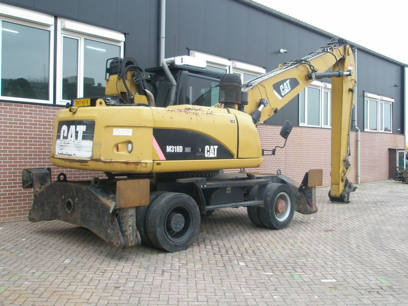 Caterpillar M318D - Escavadeira de rodas: foto 4 Caterpillar M318D - Escavadeira de rodas: foto 4