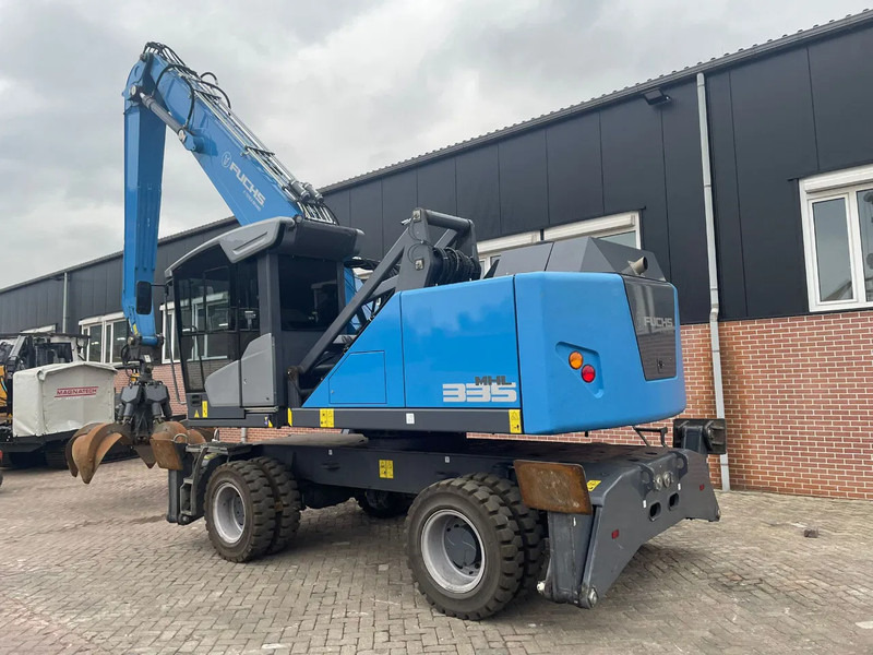 Fuchs MHL335 - Manipulador de material: foto 2 Fuchs MHL335 - Manipulador de material: foto 2
