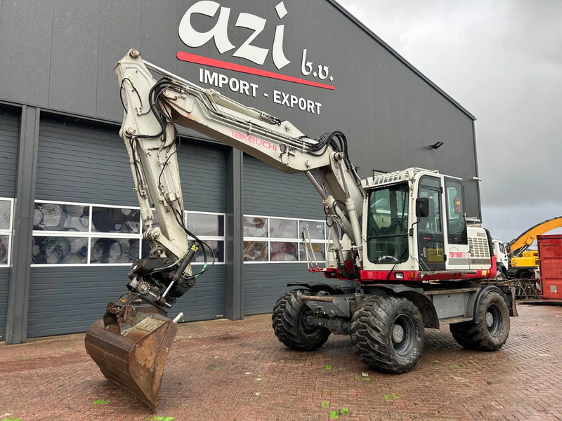 Takeuchi TB1160W - Escavadeira de rodas: foto 1 Takeuchi TB1160W - Escavadeira de rodas: foto 1
