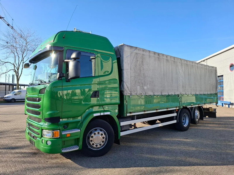 Scania R410 / GERMAN TRUCK / RETARDER / LIFT+LENKACHSE / SLIDING ROOF / SMART TACHO / PARK AIRCO / NAVI / LWDS / AUTOMATIC / EURO-6 / 2 - Caminhão com lona: foto 1 Scania R410 / GERMAN TRUCK / RETARDER / LIFT+LENKACHSE / SLIDING ROOF / SMART TACHO / PARK AIRCO / NAVI / LWDS / AUTOMATIC / EURO-6 / 2 - Caminhão com lona: foto 1