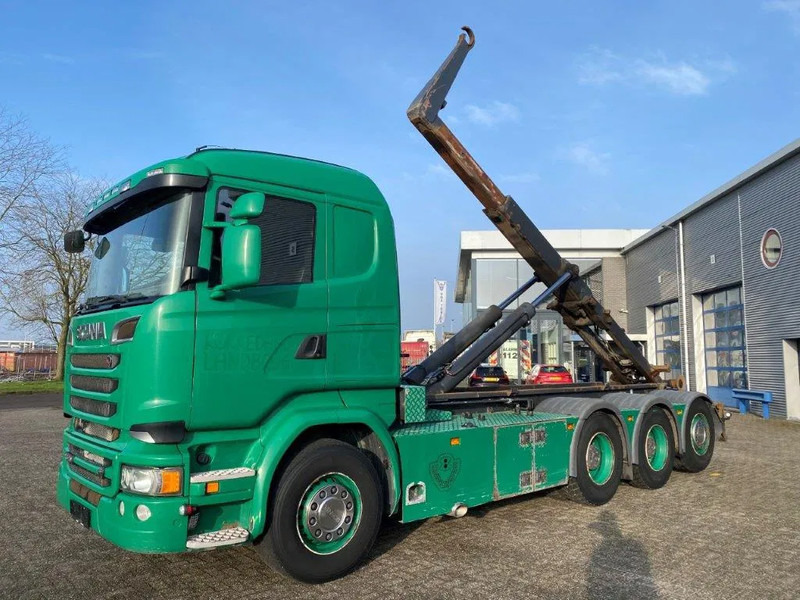 Scania R520 V8 / 8X4 / BIG AXLE / AJK HOOKLIFT 30TON / LIFT+LENKACHSE / NAVI / LEATHER / FULL-AIR / AUTOMATIC / EURO-6 / 2015 - Caminhão polibenne: foto 1 Scania R520 V8 / 8X4 / BIG AXLE / AJK HOOKLIFT 30TON / LIFT+LENKACHSE / NAVI / LEATHER / FULL-AIR / AUTOMATIC / EURO-6 / 2015 - Caminhão polibenne: foto 1