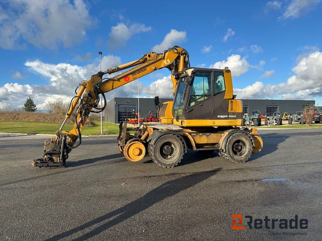 Hydrema M1600C - 2 Rail hjulgravemaskine - Escavadeira de rodas: foto 1 Hydrema M1600C - 2 Rail hjulgravemaskine - Escavadeira de rodas: foto 1