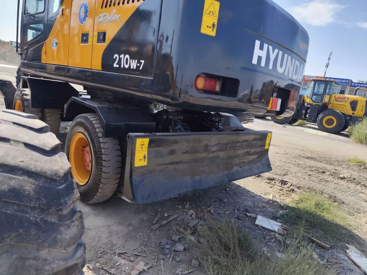 Hyundai R210-7 - Escavadeira de rodas: foto 3 Hyundai R210-7 - Escavadeira de rodas: foto 3