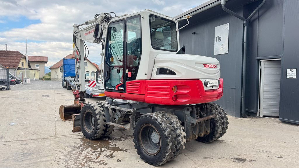 Takeuchi TB295W - 2014 Year - Powertilt - 3X Buckets - Escavadeira de rodas: foto 3 Takeuchi TB295W - 2014 Year - Powertilt - 3X Buckets - Escavadeira de rodas: foto 3