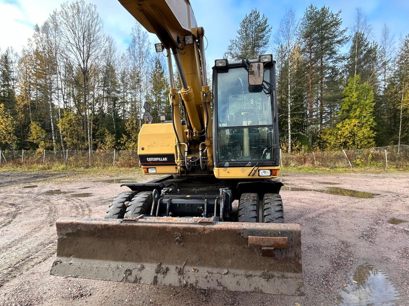 Caterpillar M312 Engcon EC20 tiltrotator - Escavadeira de rodas: foto 3 Caterpillar M312 Engcon EC20 tiltrotator - Escavadeira de rodas: foto 3