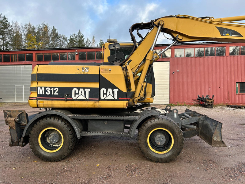Caterpillar M312 Engcon EC20 tiltrotator - Escavadeira de rodas: foto 5 Caterpillar M312 Engcon EC20 tiltrotator - Escavadeira de rodas: foto 5