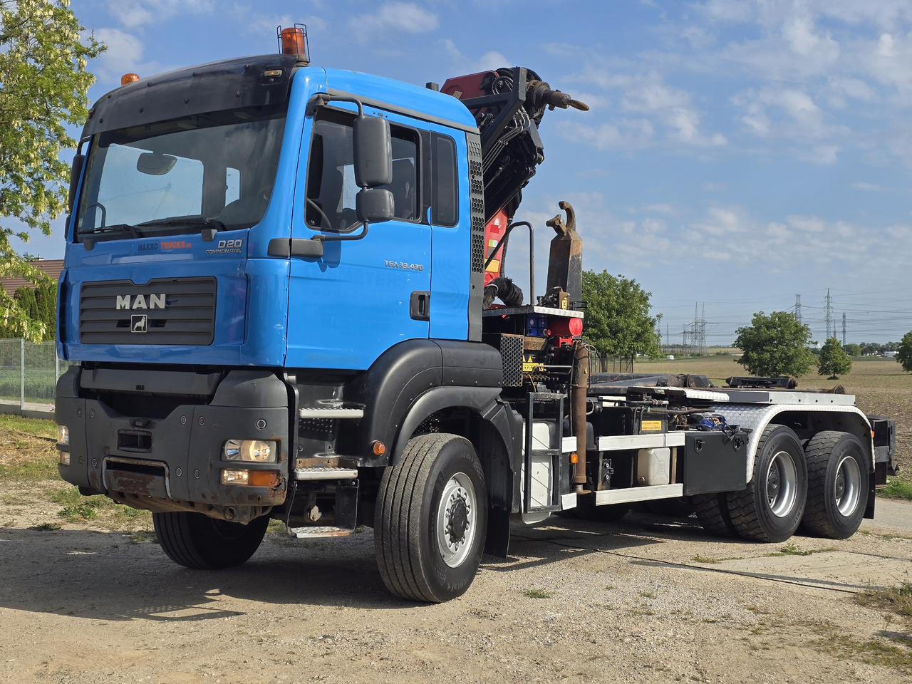 MAN TGA 33.430 6X6 / HMF 1823 K3+REM.CON./ HOOK SYSTEM 2x in stock - Caminhão polibenne, Caminhão grua: foto 1 MAN TGA 33.430 6X6 / HMF 1823 K3+REM.CON./ HOOK SYSTEM 2x in stock - Caminhão polibenne, Caminhão grua: foto 1
