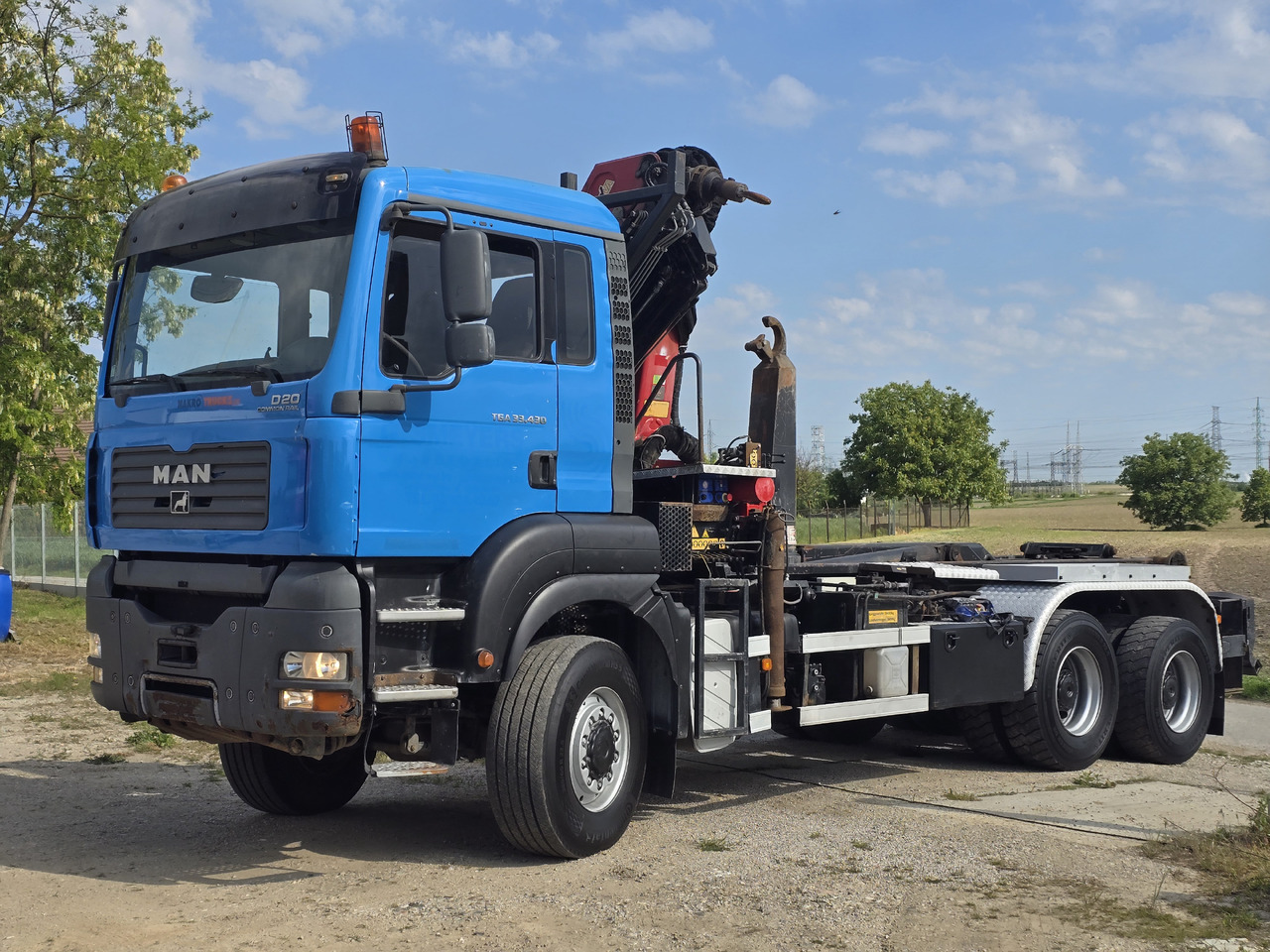 MAN TGA 33.430 6X6 / HMF 1823 K3+REM.CON./ HOOK SYSTEM 2x in stock - Caminhão polibenne, Caminhão grua: foto 3 MAN TGA 33.430 6X6 / HMF 1823 K3+REM.CON./ HOOK SYSTEM 2x in stock - Caminhão polibenne, Caminhão grua: foto 3
