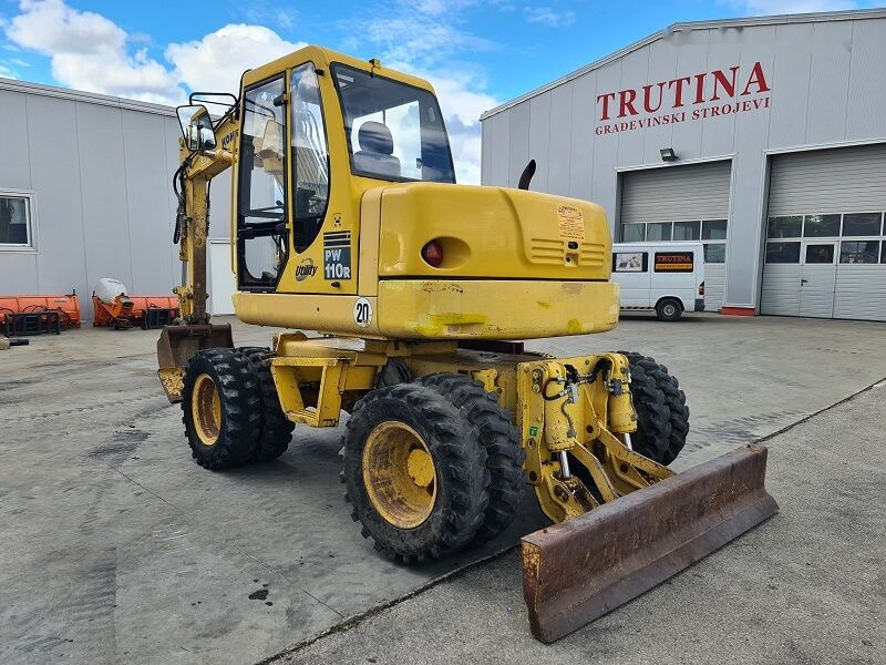 Komatsu PW110 - Escavadeira de rodas: foto 2 Komatsu PW110 - Escavadeira de rodas: foto 2