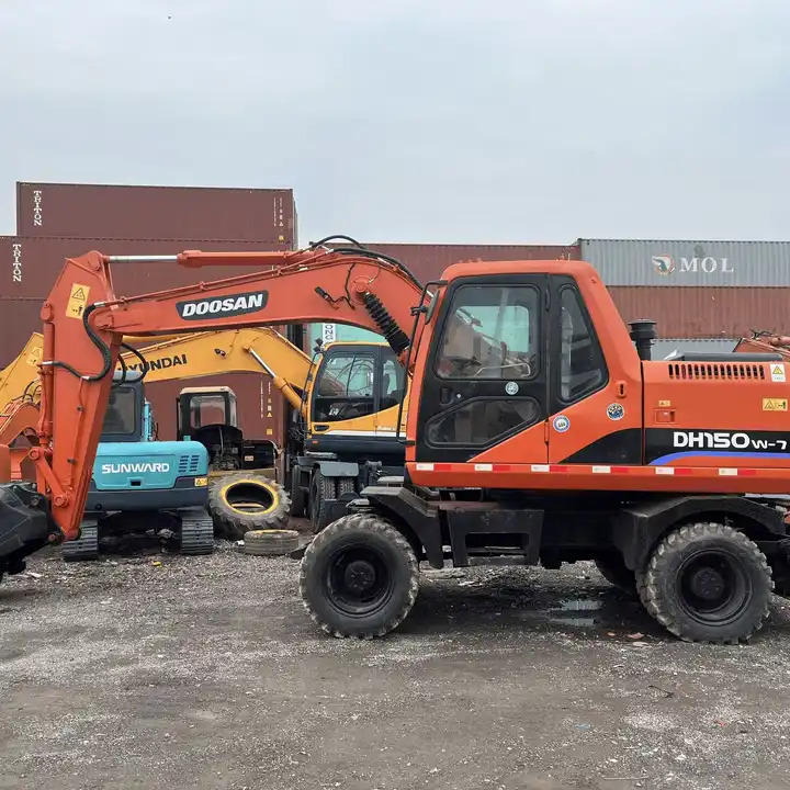 Used Doosan Dh150W-7 Medium 15 Ton Second-Hand Construction Machinery Doosan 60W/150W/210W in Stock - Escavadeira: foto 1 Used Doosan Dh150W-7 Medium 15 Ton Second-Hand Construction Machinery Doosan 60W/150W/210W in Stock - Escavadeira: foto 1
