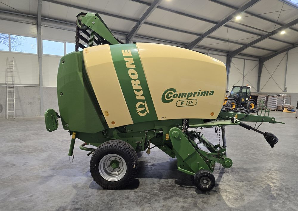 Krone Comprima F 155 - Máquina para produção de feno: foto 3 Krone Comprima F 155 - Máquina para produção de feno: foto 3