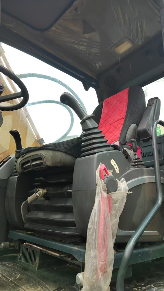 Hyundai 210 - Escavadeira de rodas: foto 3 Hyundai 210 - Escavadeira de rodas: foto 3