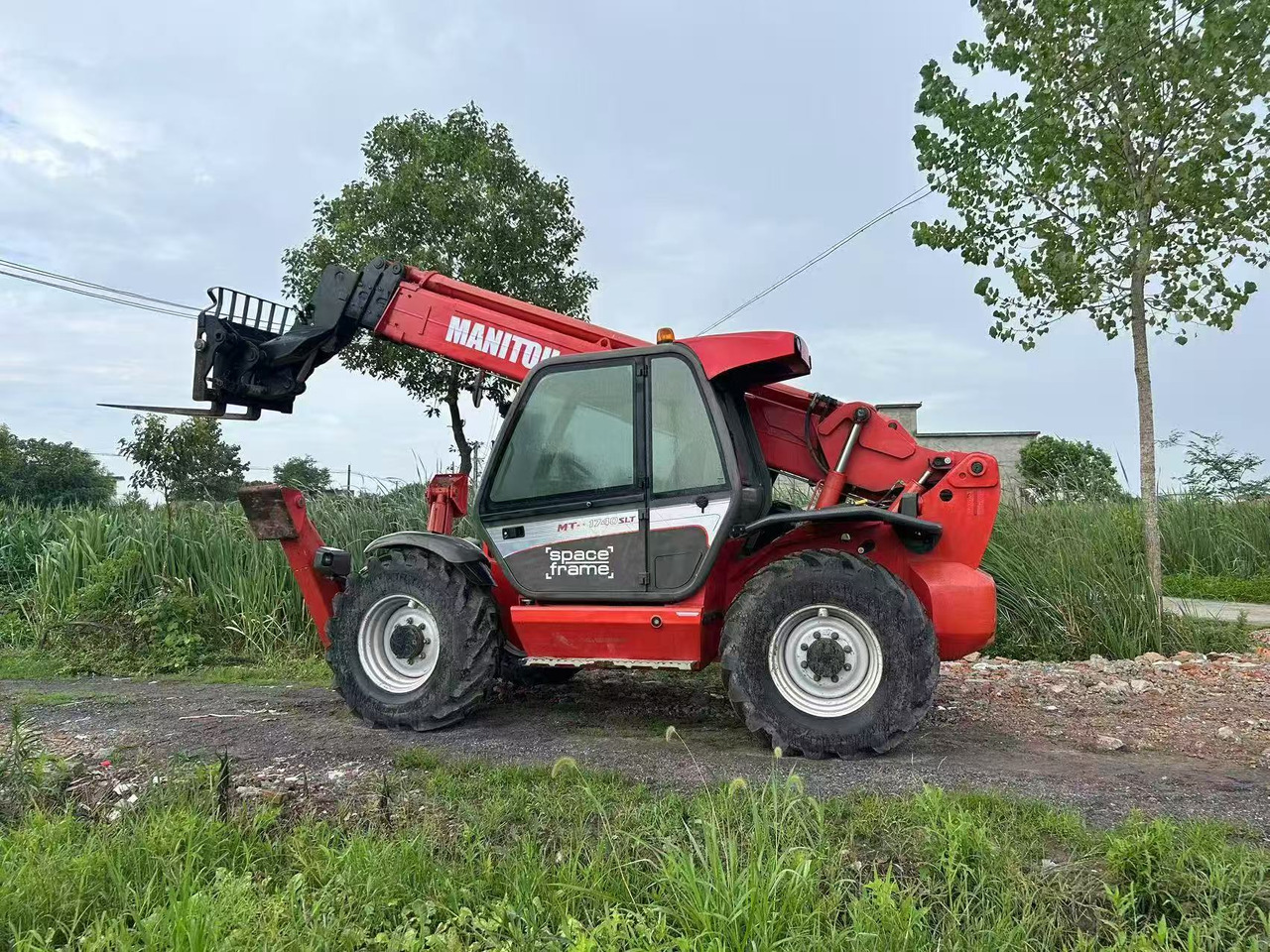 MANITOU MT-1740 - Empilhador telescópico: foto 1 MANITOU MT-1740 - Empilhador telescópico: foto 1