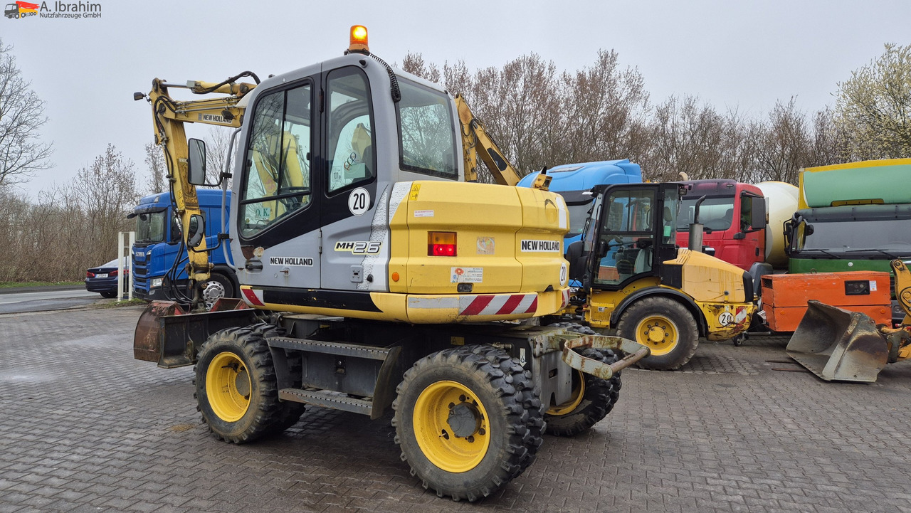 Escavadeira de rodas New Holland MH 2.6 Zustand gut, deutsche Maschine incl. Greifer und Dreservo: foto 10 Escavadeira de rodas New Holland MH 2.6 Zustand gut, deutsche Maschine incl. Greifer und Dreservo: foto 10
