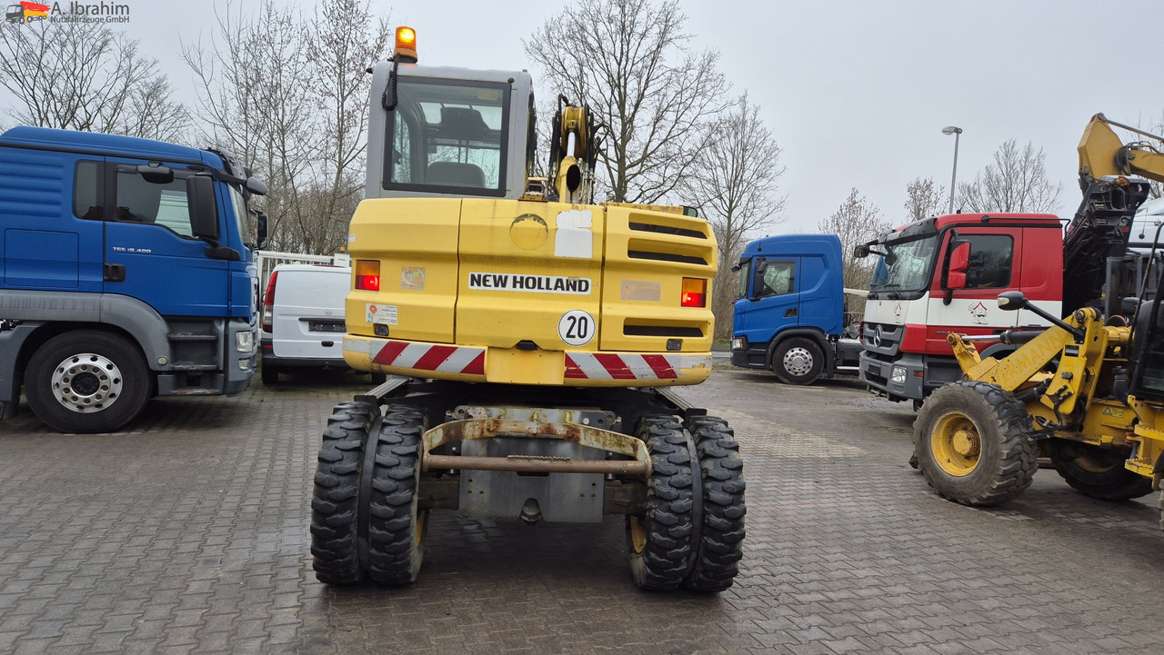 Escavadeira de rodas New Holland MH 2.6 Zustand gut, deutsche Maschine incl. Greifer und Dreservo: foto 11 Escavadeira de rodas New Holland MH 2.6 Zustand gut, deutsche Maschine incl. Greifer und Dreservo: foto 11