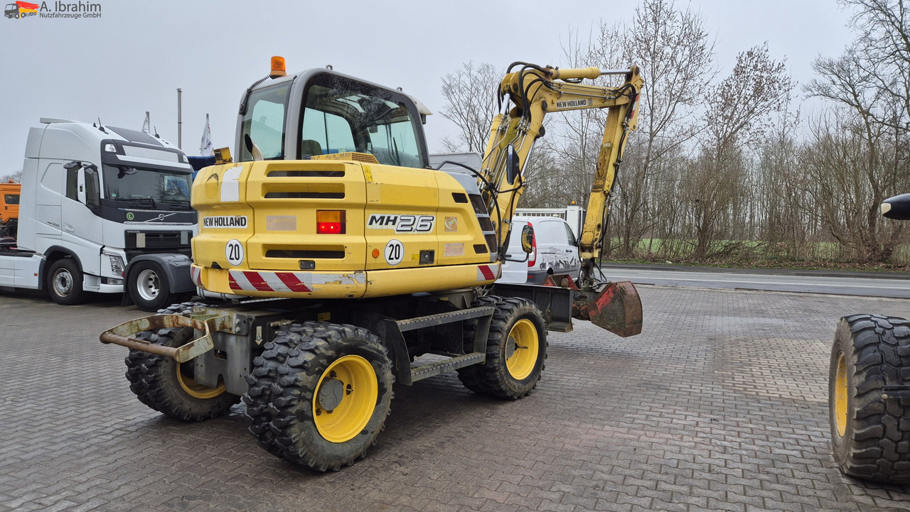Escavadeira de rodas New Holland MH 2.6 Zustand gut, deutsche Maschine incl. Greifer und Dreservo: foto 12 Escavadeira de rodas New Holland MH 2.6 Zustand gut, deutsche Maschine incl. Greifer und Dreservo: foto 12