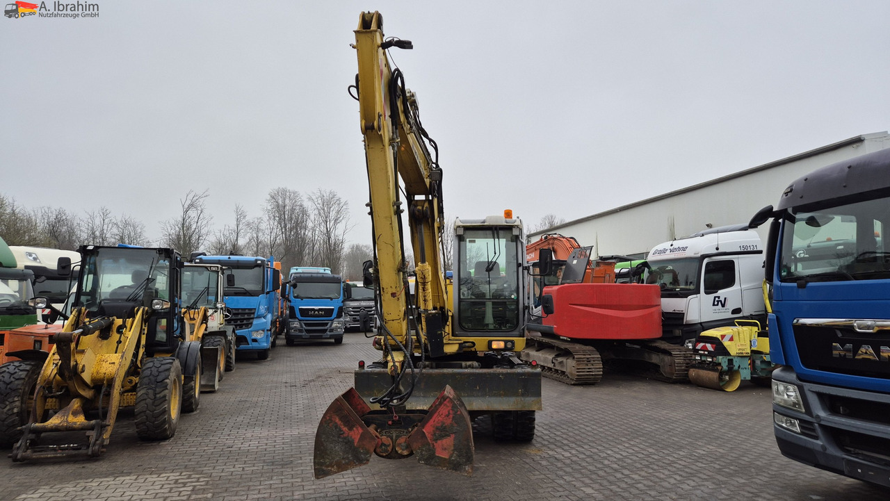 Escavadeira de rodas New Holland MH 2.6 Zustand gut, deutsche Maschine incl. Greifer und Dreservo: foto 8 Escavadeira de rodas New Holland MH 2.6 Zustand gut, deutsche Maschine incl. Greifer und Dreservo: foto 8