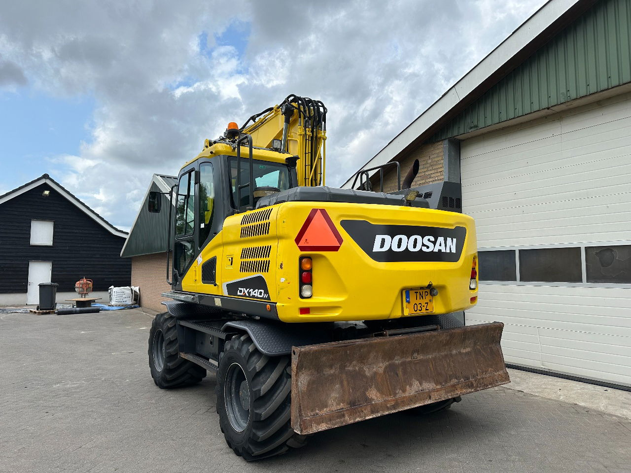 Doosan DX140W-5 - Escavadeira de rodas: foto 4 Doosan DX140W-5 - Escavadeira de rodas: foto 4