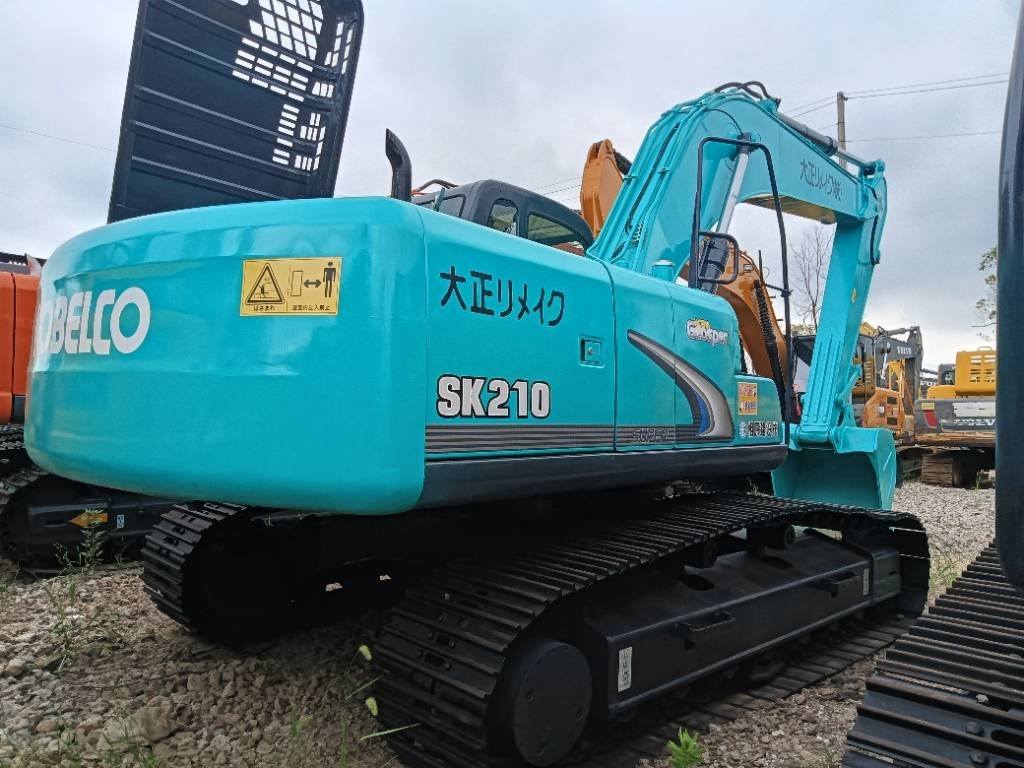 Kobelco SK 210 - Escavadora de rastos: foto 1 Kobelco SK 210 - Escavadora de rastos: foto 1