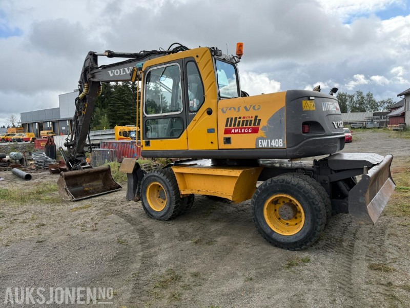 2006 Volvo EW140B Hjulgraver m/pallegaffel og skuff - Steelwrist tiltrotator. - Escavadeira: foto 5 2006 Volvo EW140B Hjulgraver m/pallegaffel og skuff - Steelwrist tiltrotator. - Escavadeira: foto 5