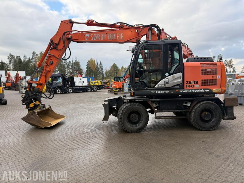 2014 Hitachi Zaxis 140W HJULGRAVER ENGCON ROTOTILT SERVICEHISTORIKK SENTRALSMØRING. - Escavadeira: foto 1 2014 Hitachi Zaxis 140W HJULGRAVER ENGCON ROTOTILT SERVICEHISTORIKK SENTRALSMØRING. - Escavadeira: foto 1