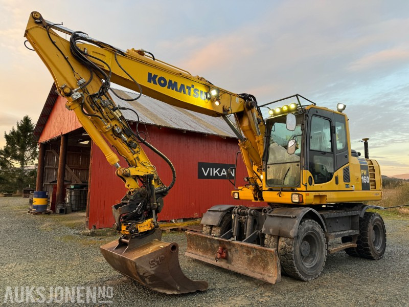 2015 Komatsu PW 160-8 Velutstyrt hjulgraver med Engcon rototilt, Leica GPS og sentralsmøring - Escavadeira: foto 1 2015 Komatsu PW 160-8 Velutstyrt hjulgraver med Engcon rototilt, Leica GPS og sentralsmøring - Escavadeira: foto 1